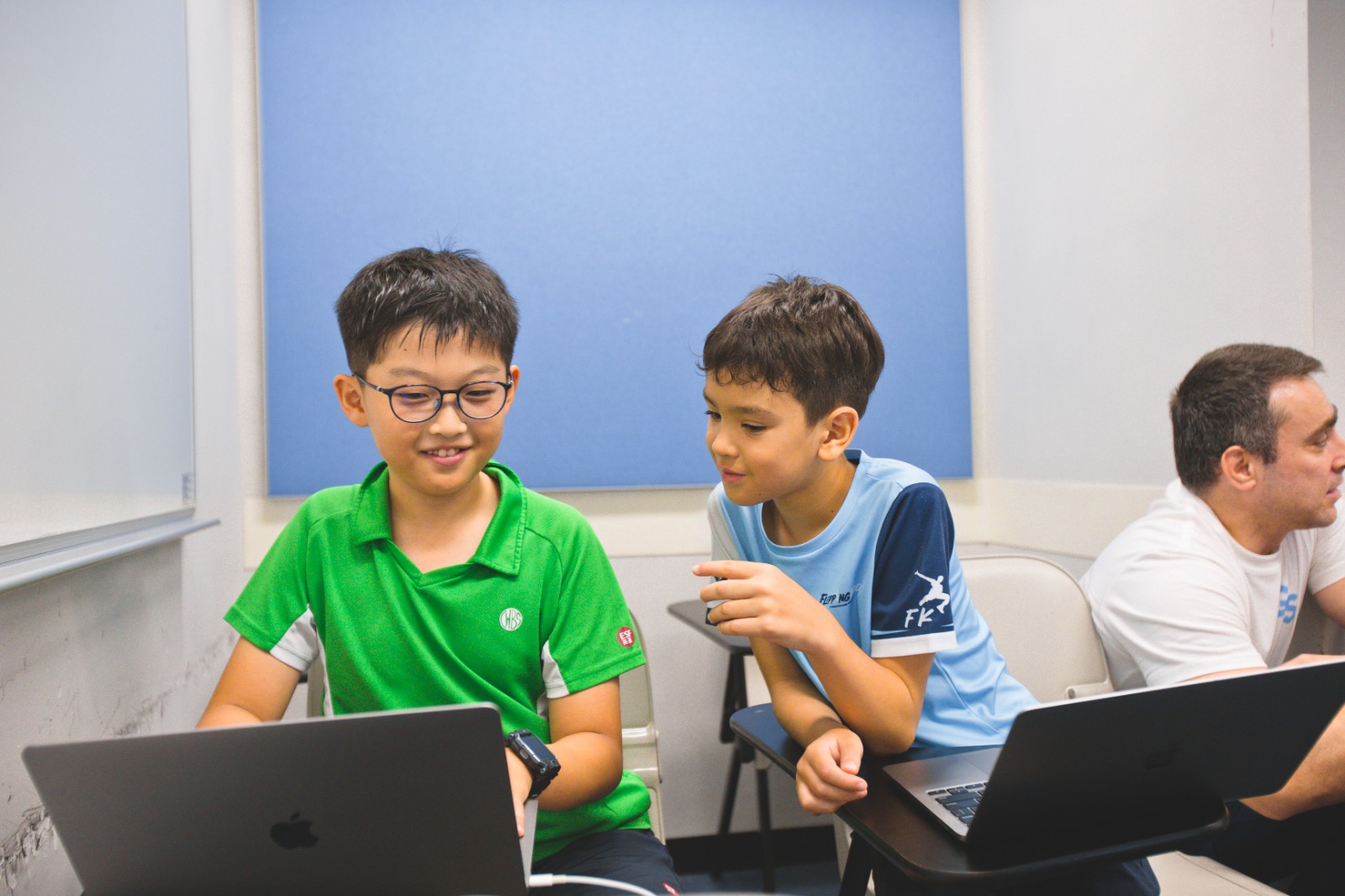 Children exploring AI and coding projects