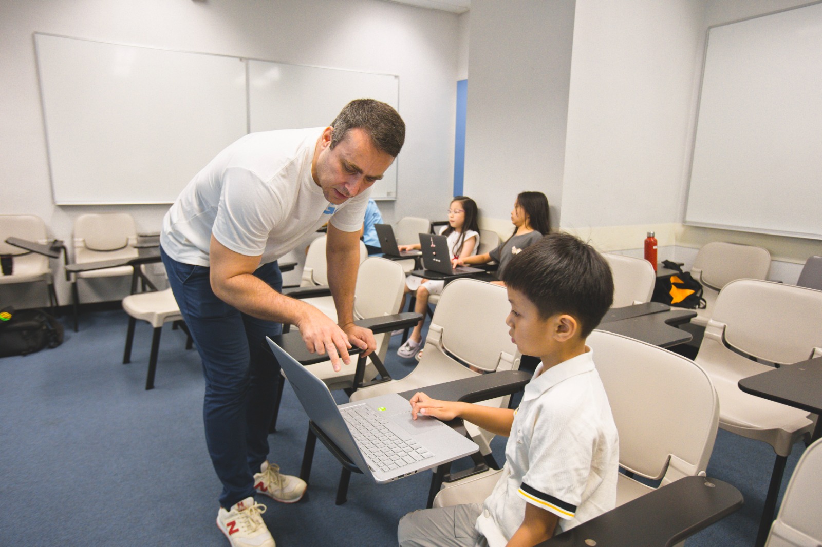 Children learning coding and AI in class
